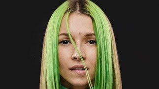Vibrant green hair transformation on Partybody, showcasing bold and colorful hair styling.