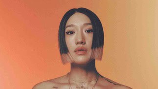 Asian woman with short black hair on Partybody.