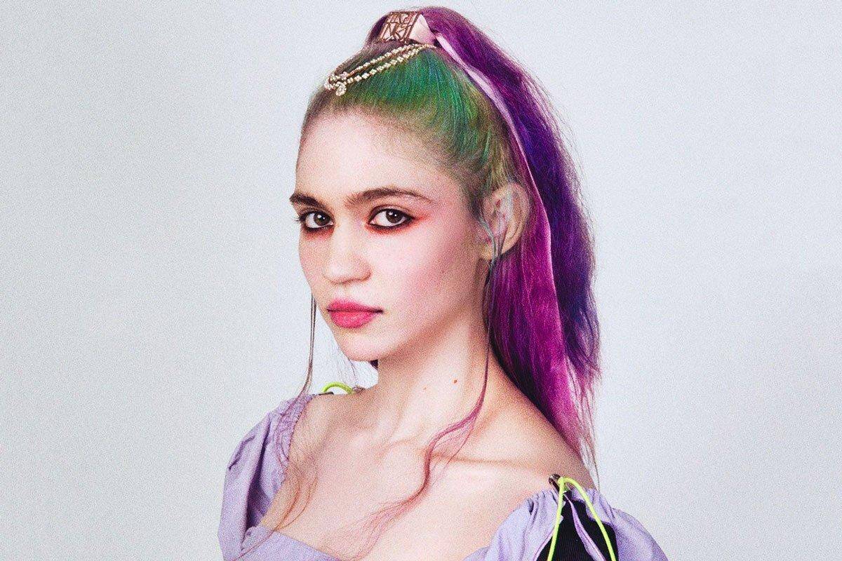 Brightly colored hair with purple, green, and pink shades on Partybody.